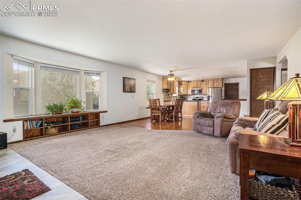 4810 Airport Road Colorado Springs, CO 80916 - Photo 7 of 41 a view of a livingroom with furniture and a window