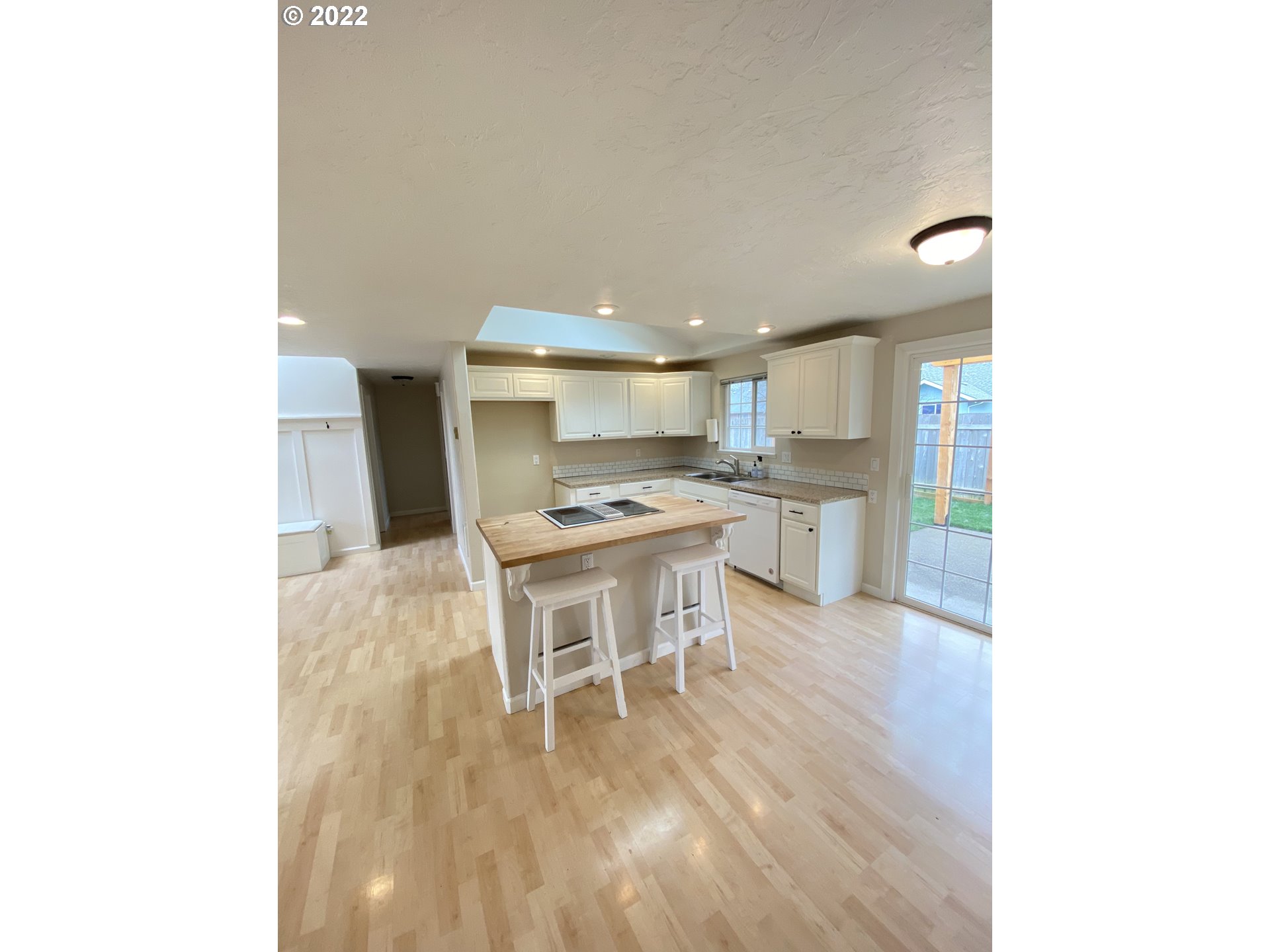 5330 B Street Springfield, OR 97478 - Photo 11 of 28 a kitchen with a sink and chairs