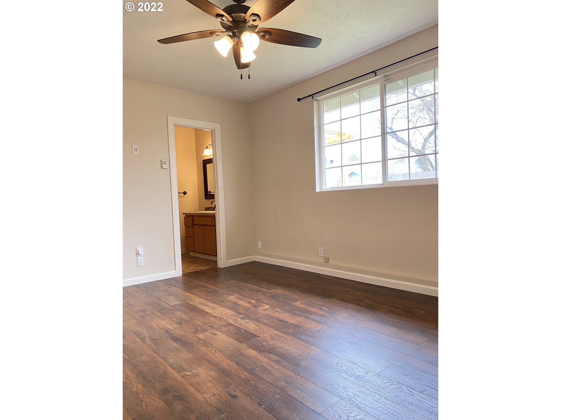 5330 B Street Springfield, OR 97478 - Photo 18 of 28 a view of an empty room with a window