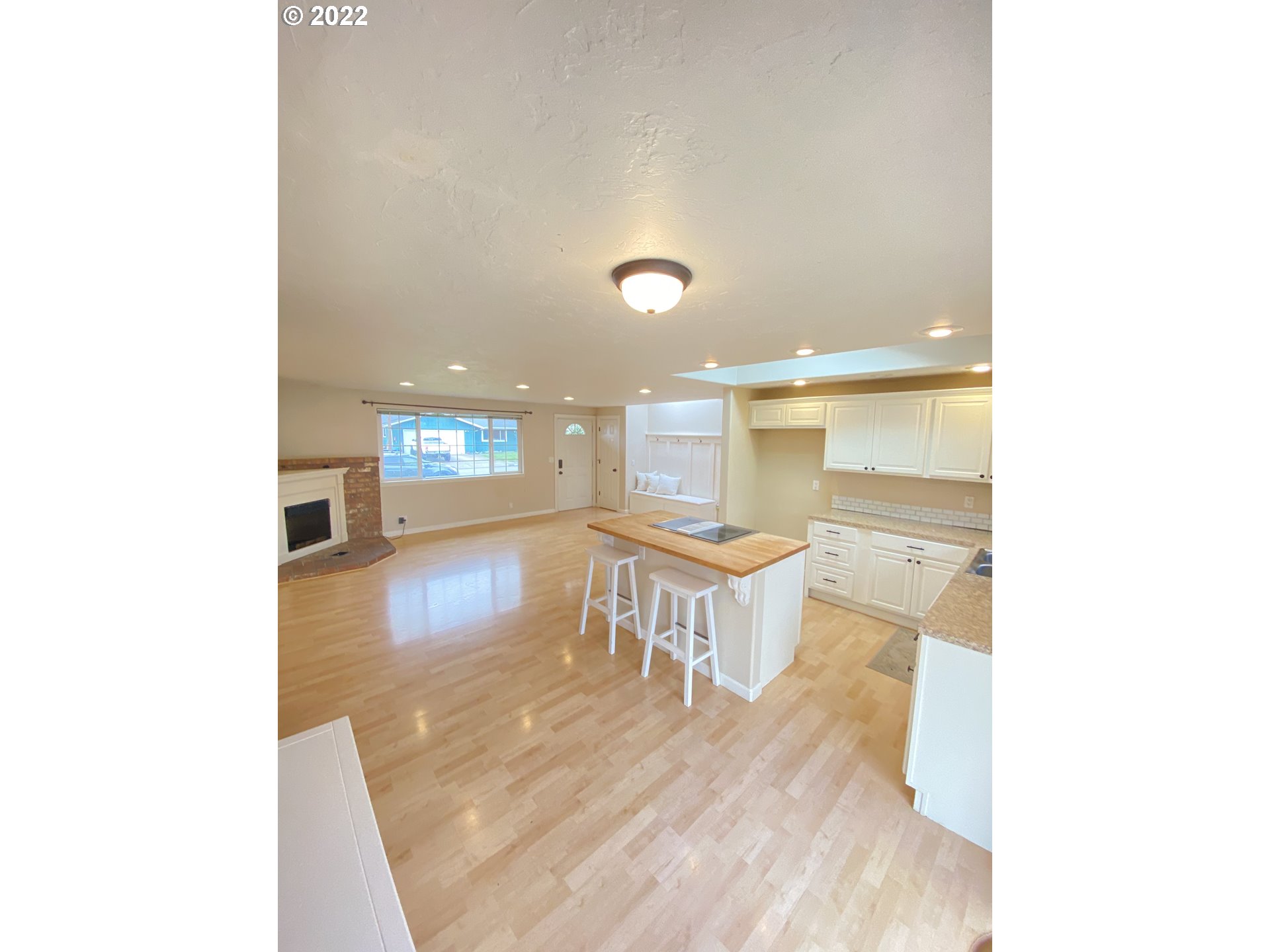 5330 B Street Springfield, OR 97478 - Photo 3 of 28 a view of a living room with kitchen and a sink