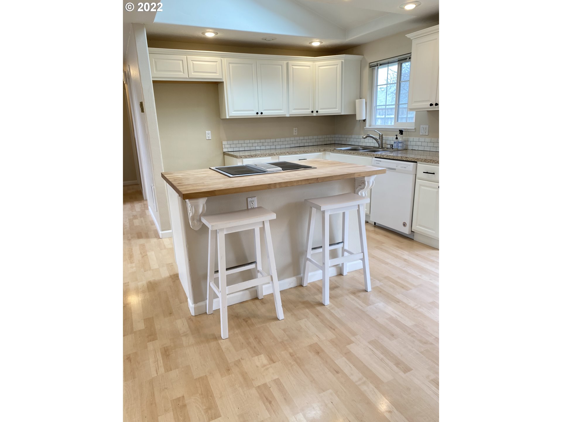 5330 B Street Springfield, OR 97478 - Photo 5 of 28 a kitchen with a sink cabinets and wooden floor