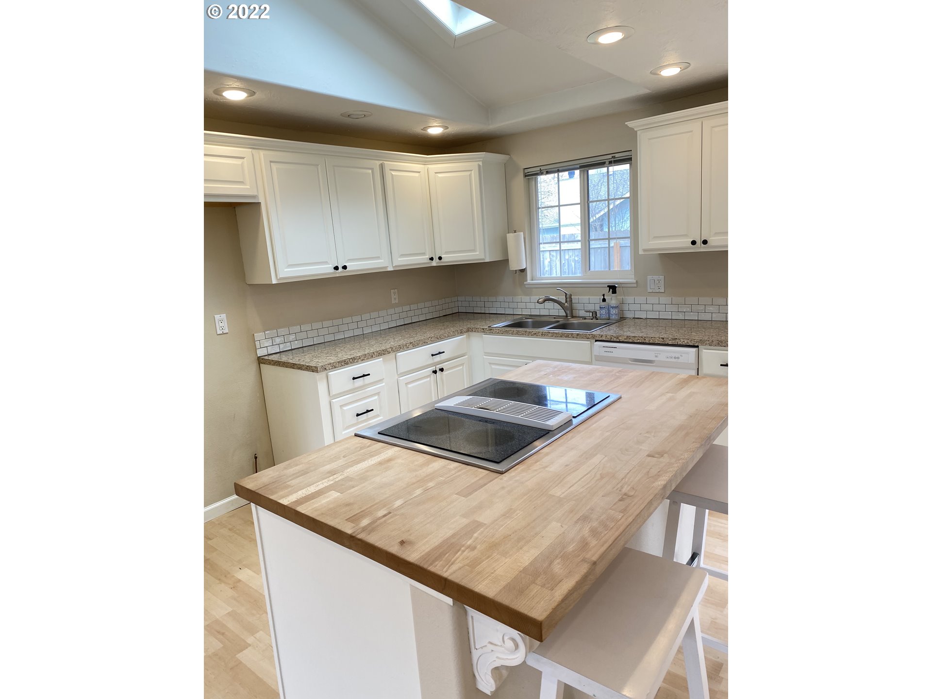 5330 B Street Springfield, OR 97478 - Photo 6 of 28 a kitchen with a sink a stove and cabinets