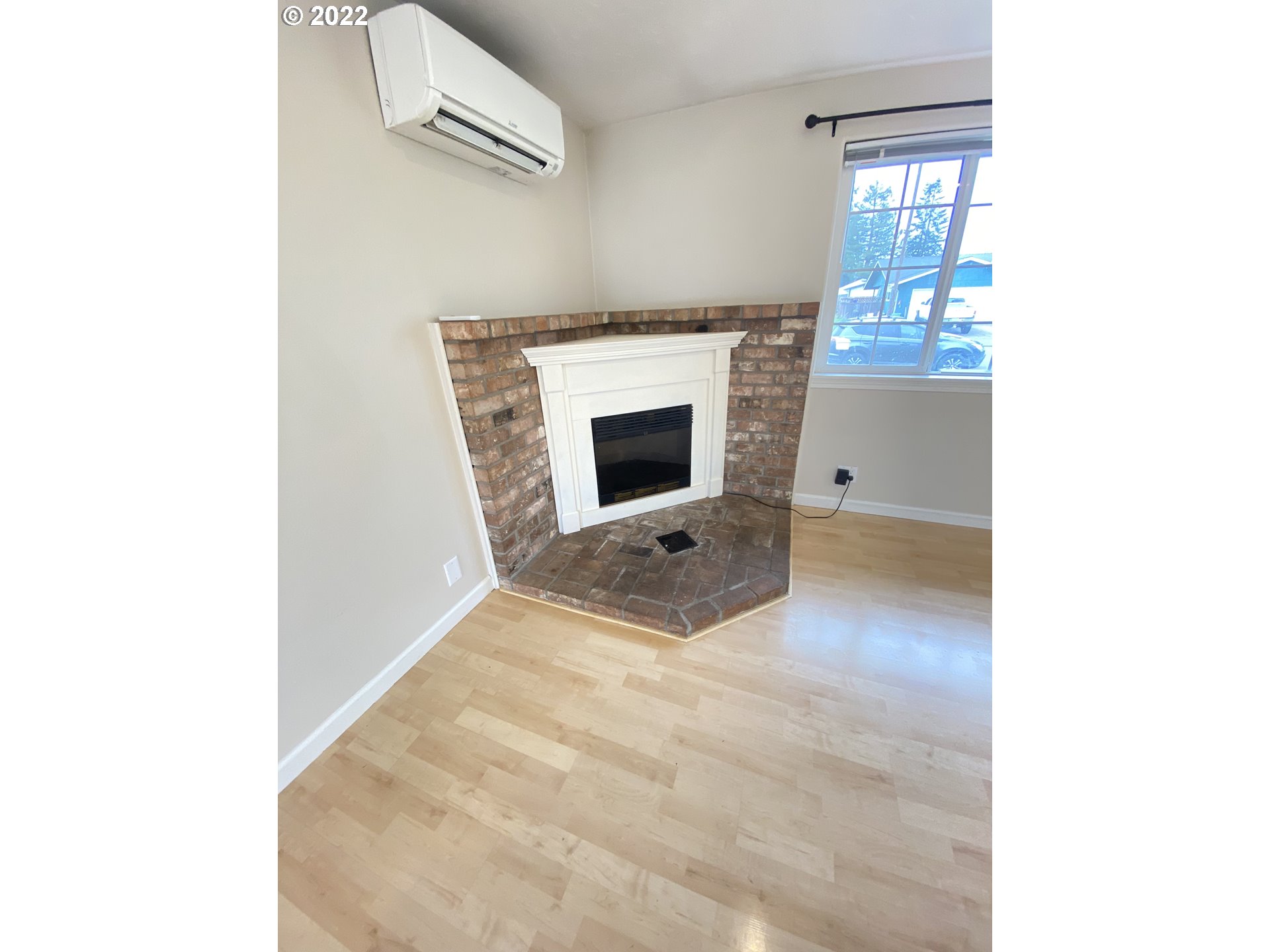 5330 B Street Springfield, OR 97478 - Photo 8 of 28 a view of a livingroom with a fireplace