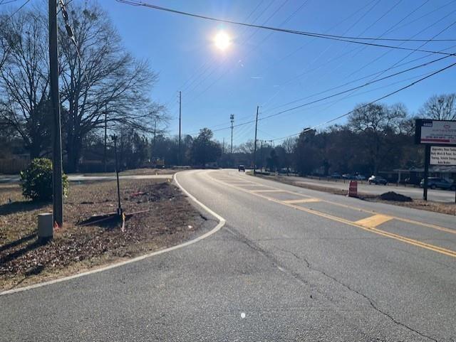 4595 Austell Powder Springs Road Southwest Austell, GA 30106 - Photo 4 of 16 a backyard of a house with lots of green space