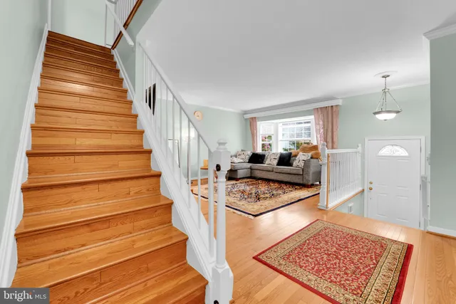 a view of kitchen with stove and microwave