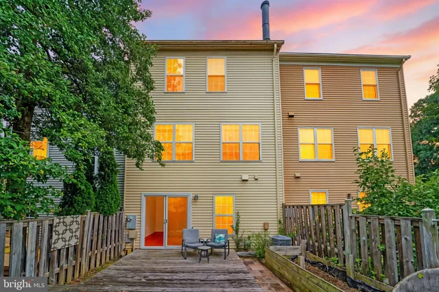 a front view of a house with glass windows