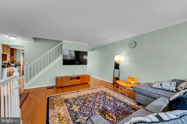 a bedroom with a bed and flat screen tv