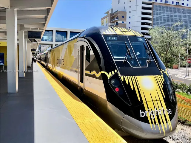 a view of swimming pool with seating area