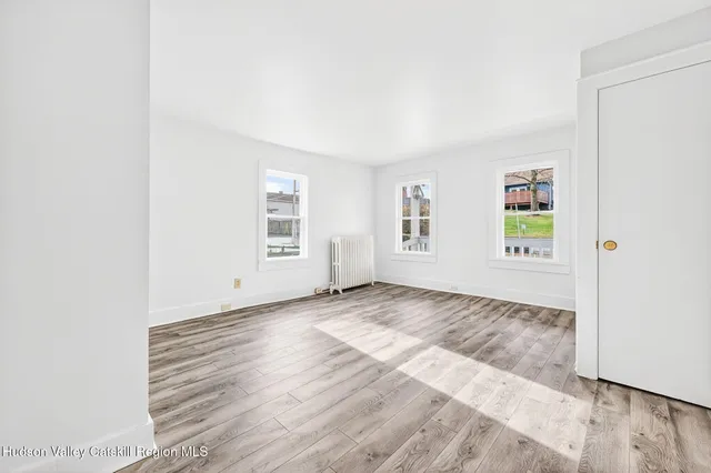 an empty room with windows