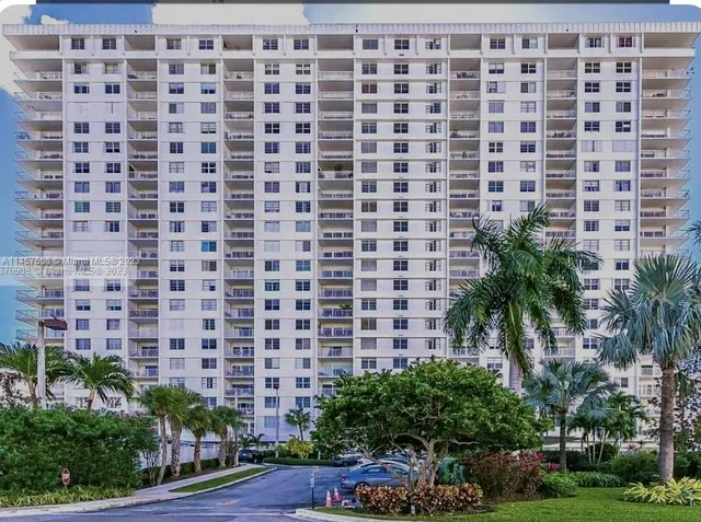 a brick building with a black and white checkered floor