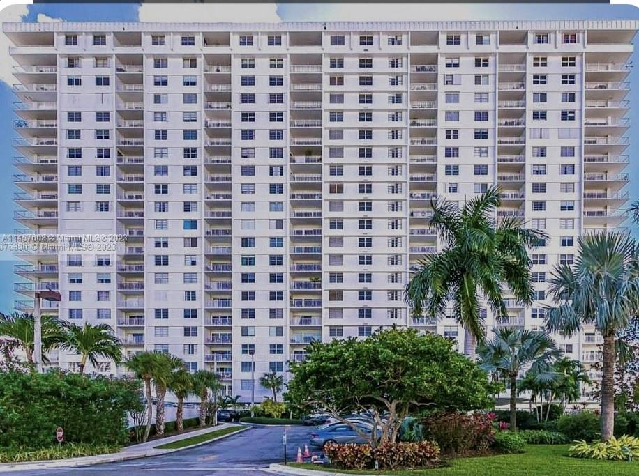 500 Bayview Drive, Unit 1417 Sunny Isles Beach, FL 33160 - Photo 4 of 13 a brick building with a black and white checkered floor