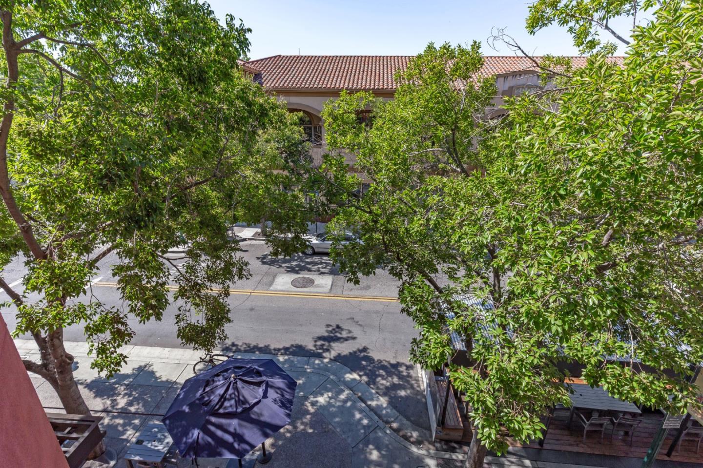 21 North 2nd Street, Unit 303 Campbell, CA 95008 - Photo 11 of 29 a backyard of a house with a yard and outdoor seating