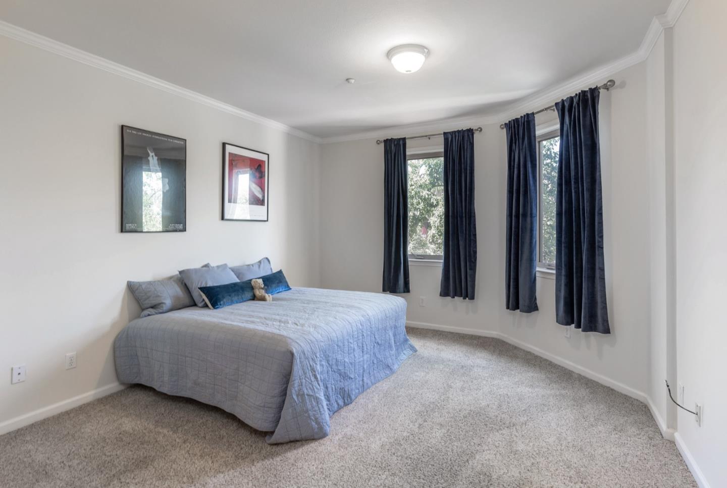 21 North 2nd Street, Unit 303 Campbell, CA 95008 - Photo 15 of 29 a bedroom with a large bed and a window