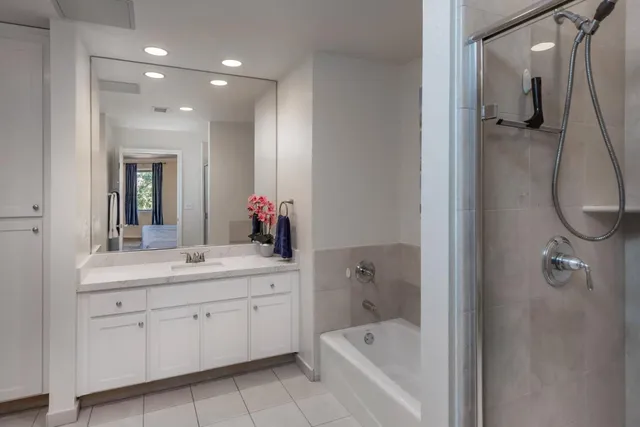 a bathroom with a sink a toilet and a bathtub