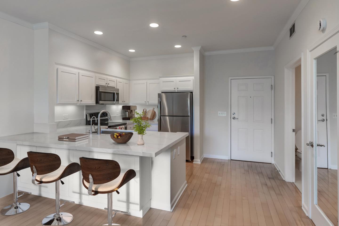 21 North 2nd Street, Unit 303 Campbell, CA 95008 - Photo 2 of 29 a kitchen with refrigerator and cabinets