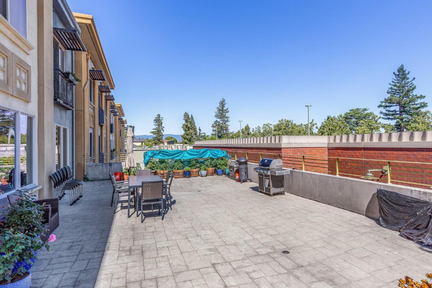 21 North 2nd Street, Unit 303 Campbell, CA 95008 - Photo 22 of 29 a view of terrace with seating space and trees in the background