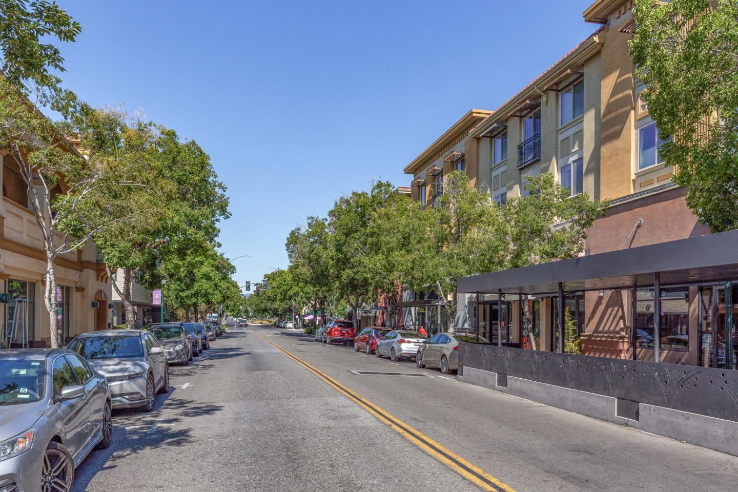 21 North 2nd Street, Unit 303 Campbell, CA 95008 - Photo 25 of 29 a city street lined with parked cars and buildings