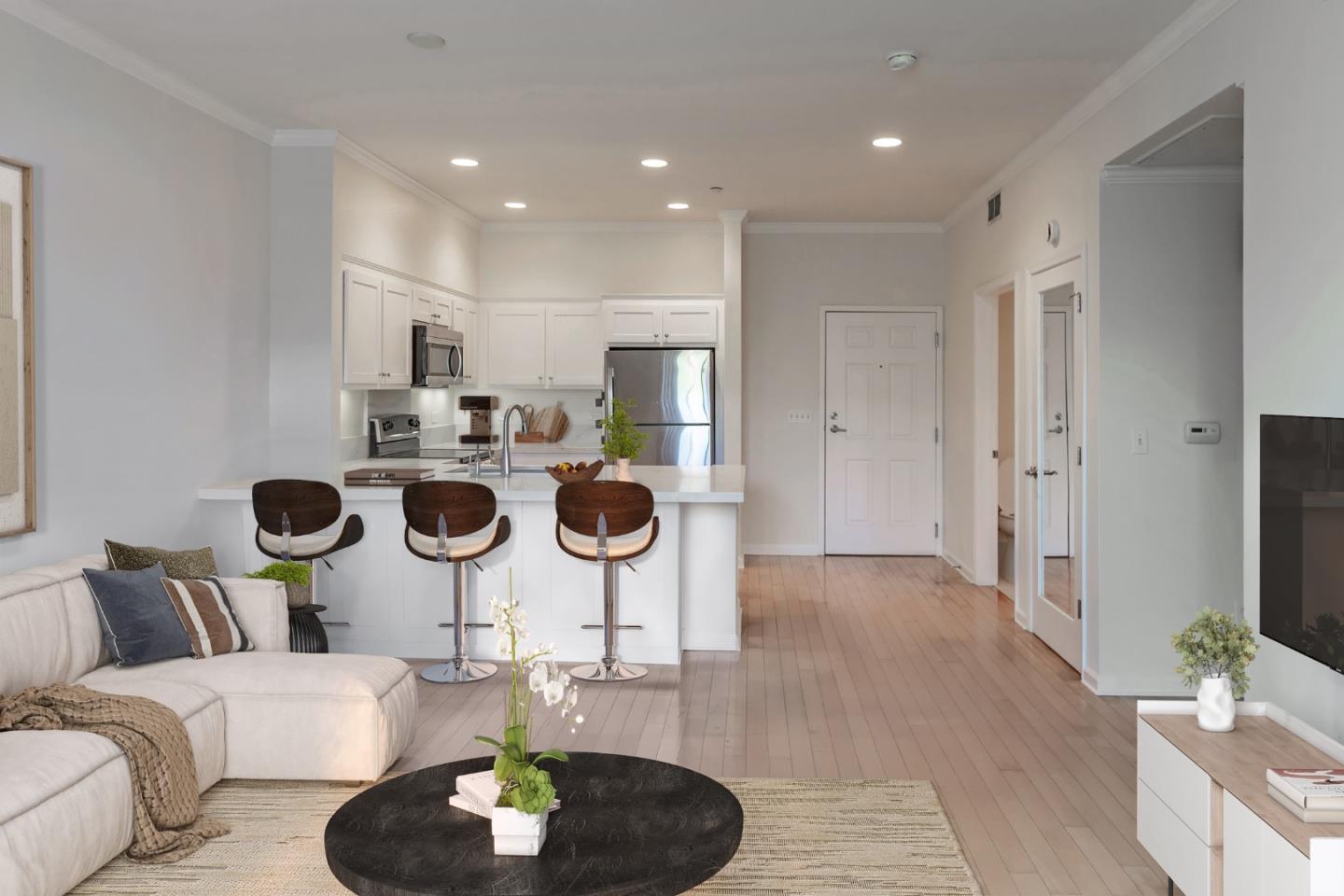 21 North 2nd Street, Unit 303 Campbell, CA 95008 - Photo 3 of 29 a living room with furniture a table and a flat screen tv