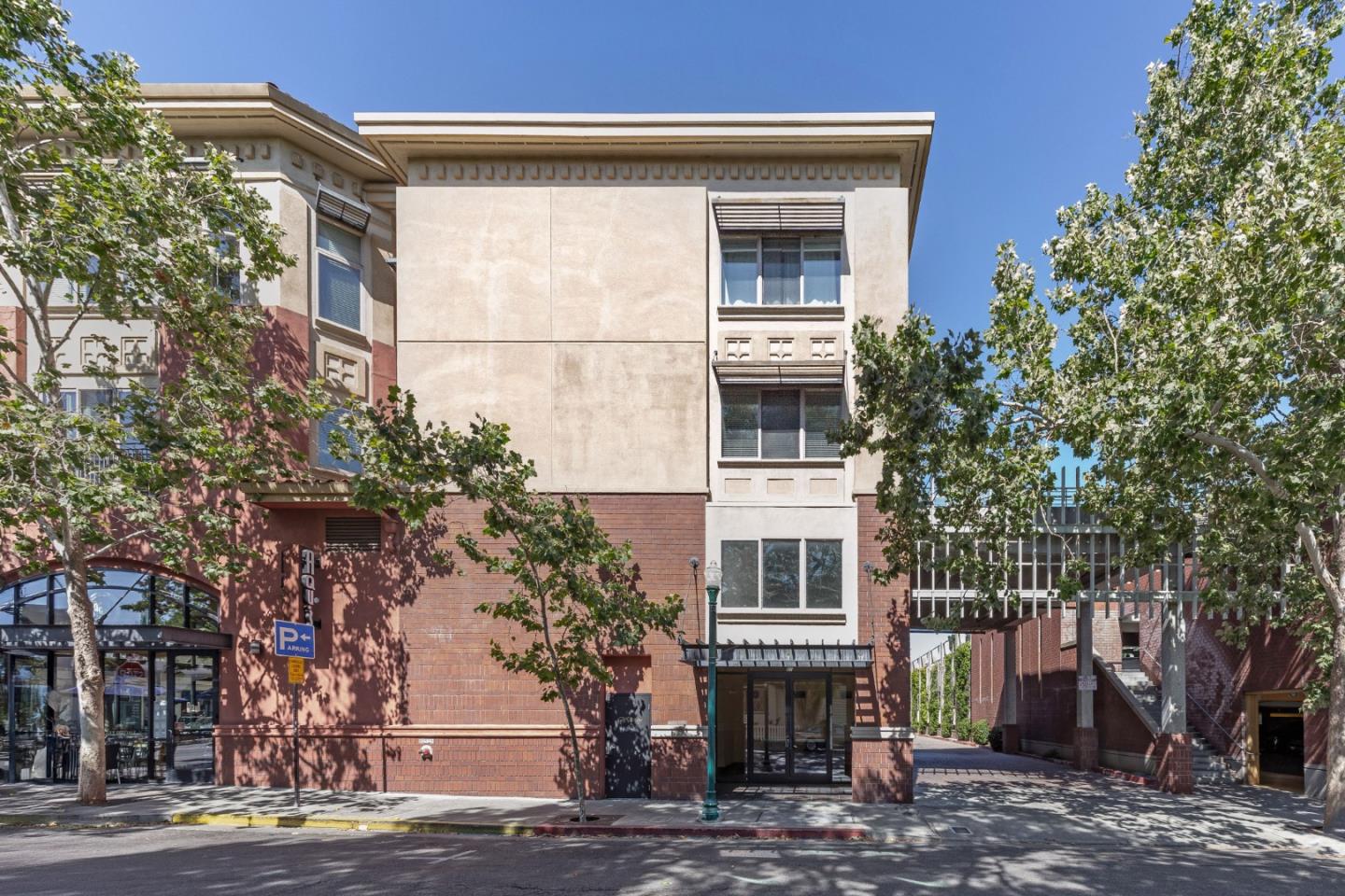 21 North 2nd Street, Unit 303 Campbell, CA 95008 - Photo 7 of 29 a front view of a house with a yard