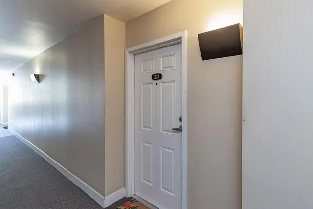 a view of a hallway with closet
