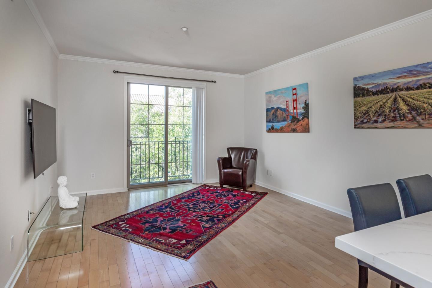 21 North 2nd Street, Unit 303 Campbell, CA 95008 - Photo 10 of 29 a living room with furniture and a flat screen tv