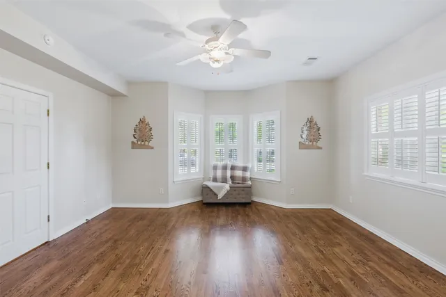 a painting on the wall next to a window