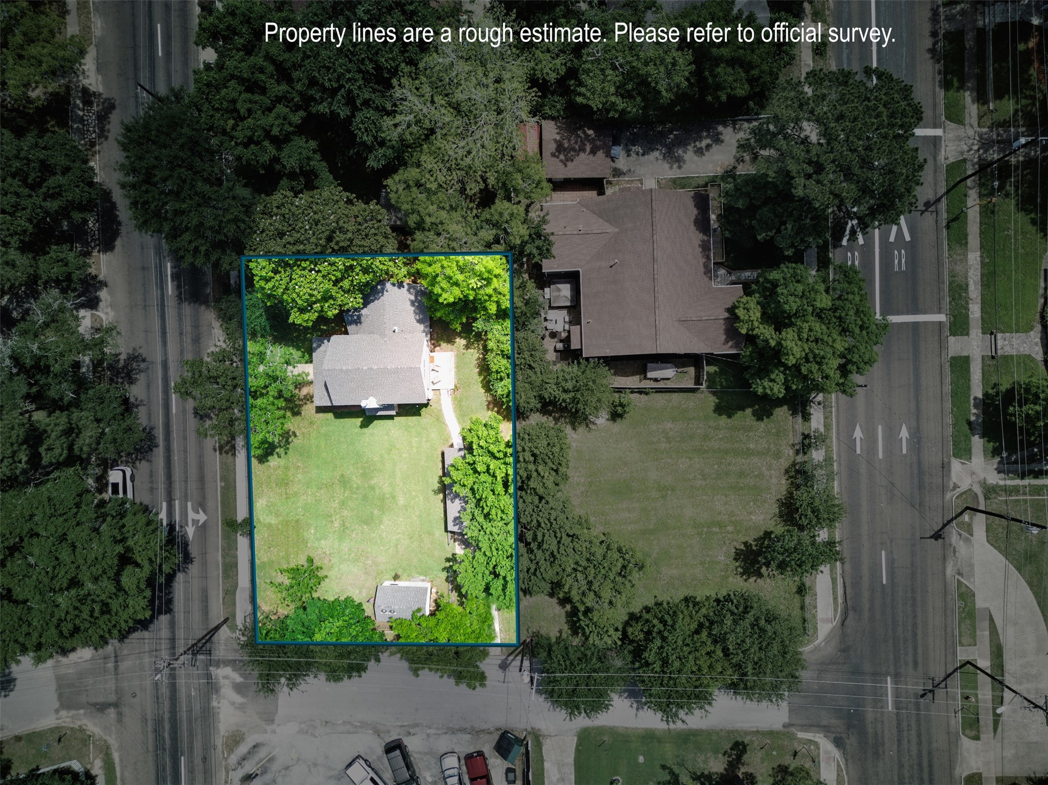 407 West Main Street Brenham, TX 77833 - Photo 2 of 50 an aerial view of a house with garden space and street view