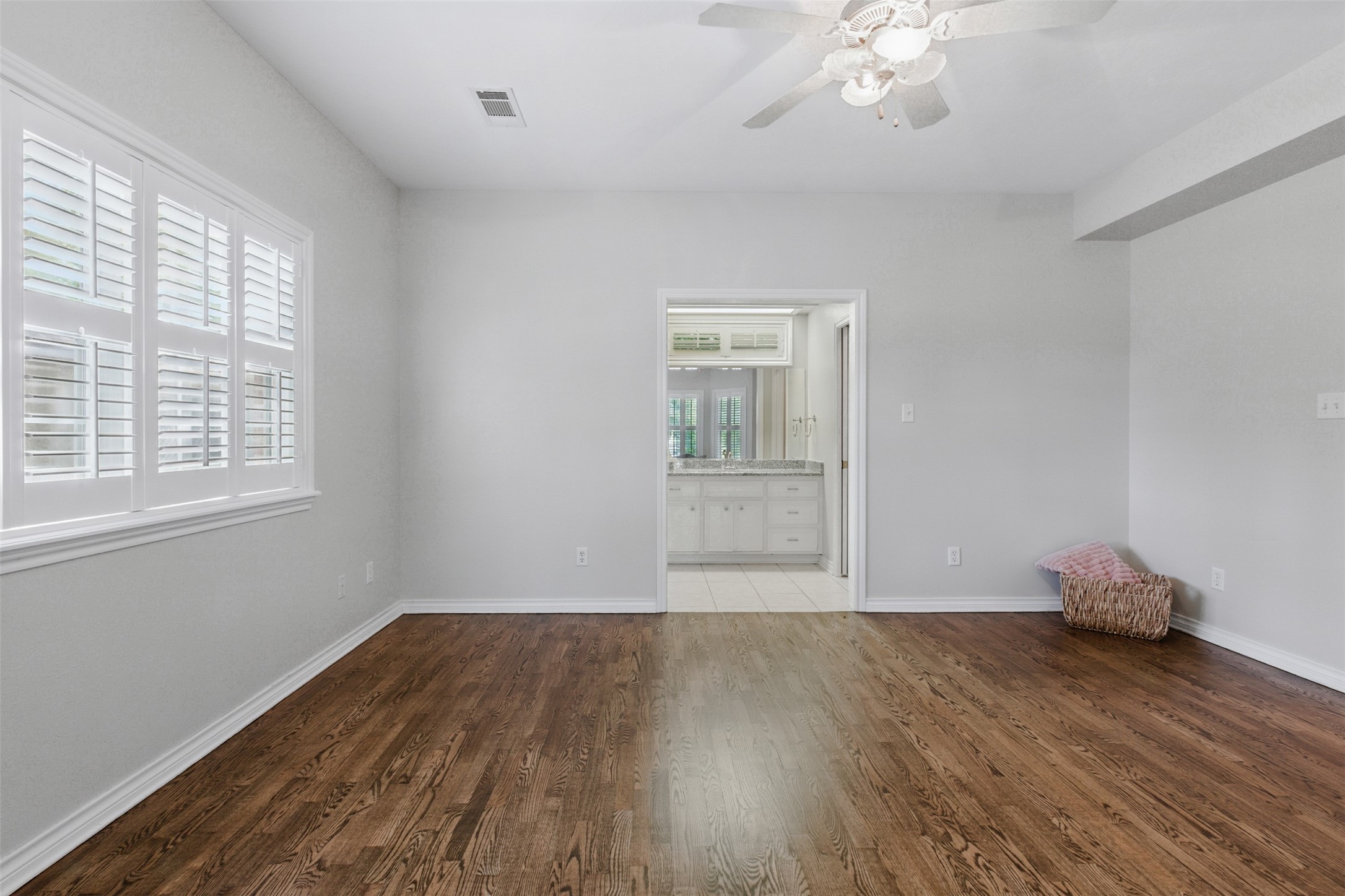 407 West Main Street Brenham, TX 77833 - Photo 21 of 50 a view of wooden floor and windows in a room