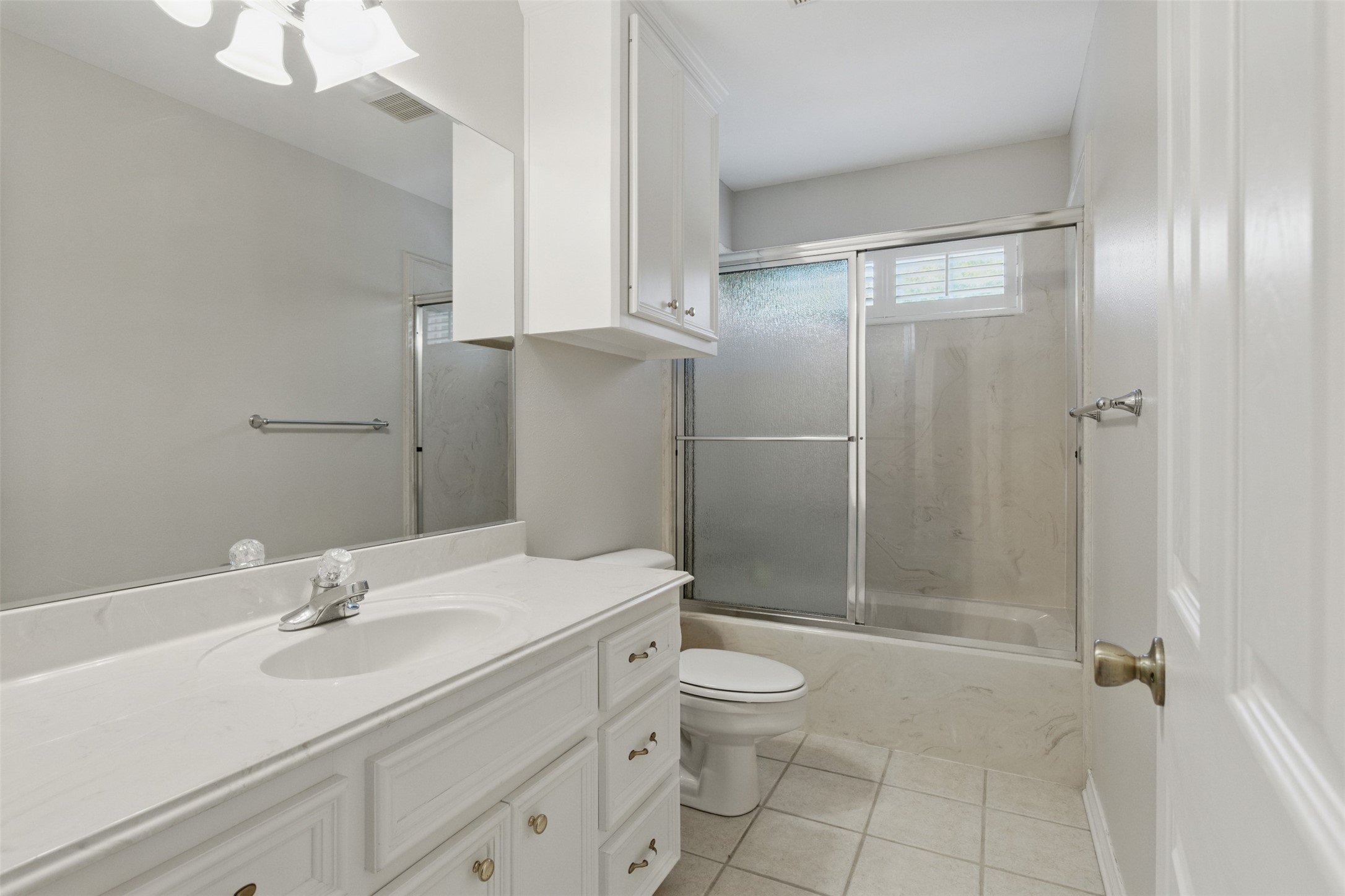 407 West Main Street Brenham, TX 77833 - Photo 27 of 50 a bathroom with a sink toilet and shower