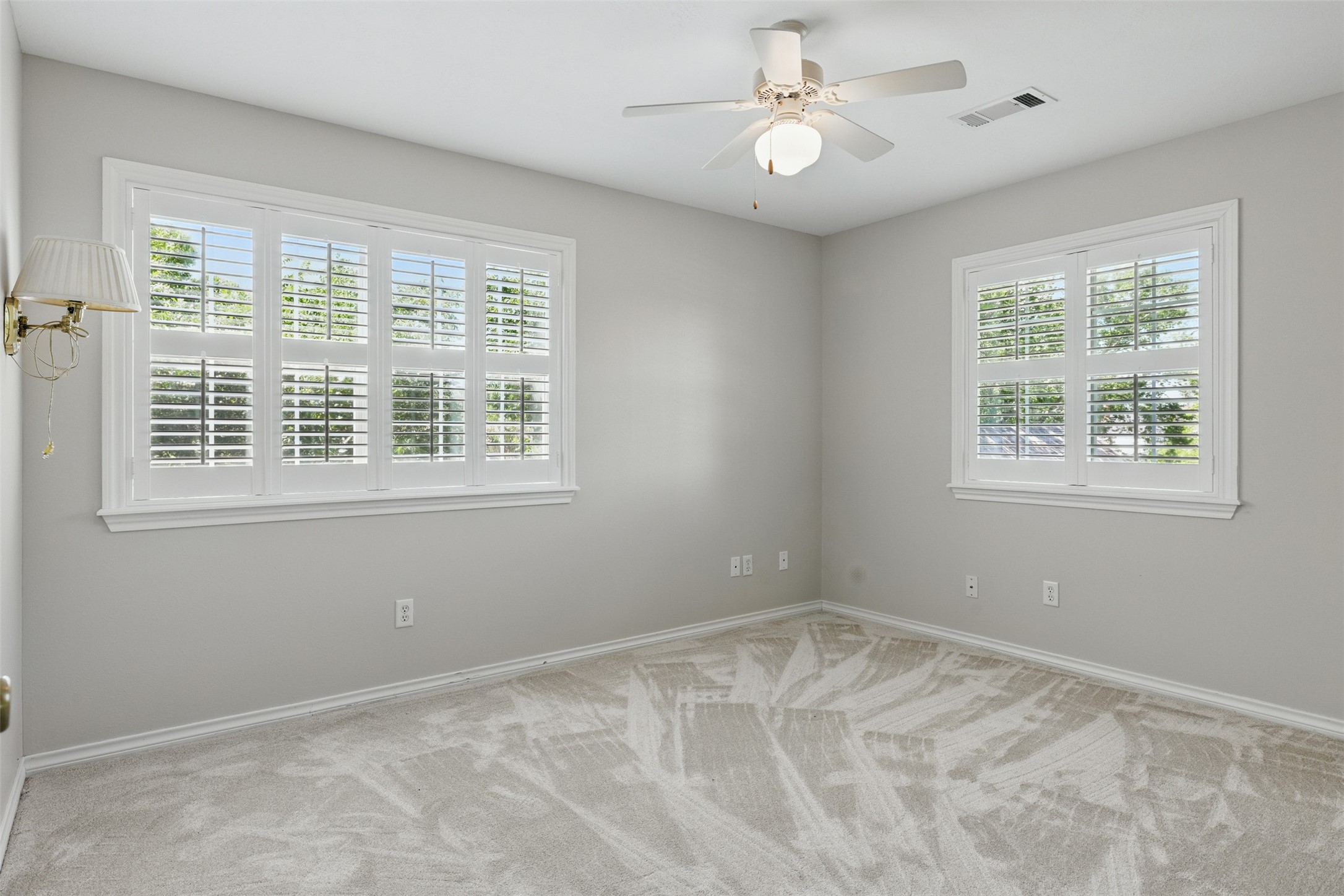 407 West Main Street Brenham, TX 77833 - Photo 28 of 50 a view of an empty room with a window