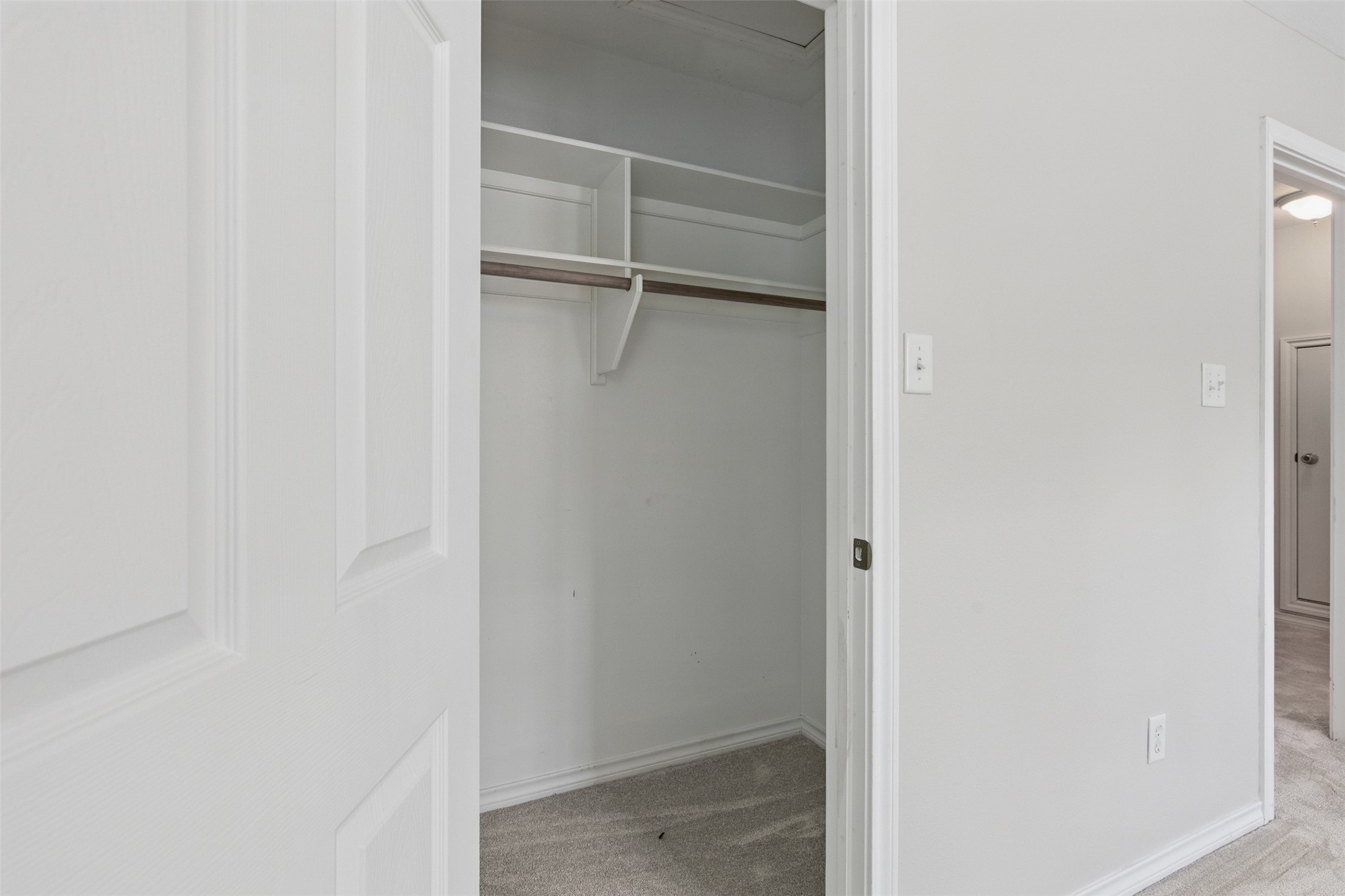 407 West Main Street Brenham, TX 77833 - Photo 30 of 50 a view of an empty walk in closet