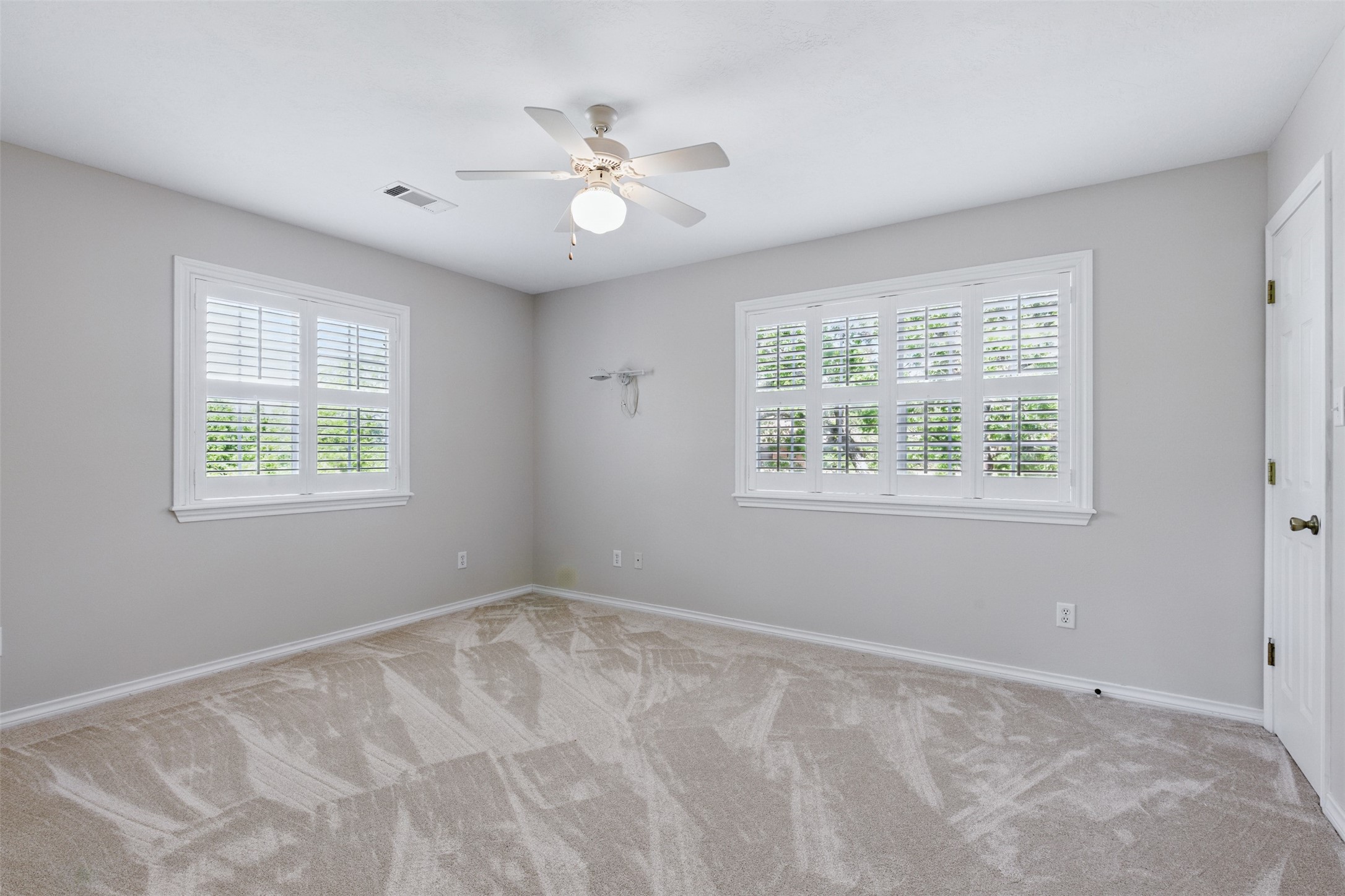 407 West Main Street Brenham, TX 77833 - Photo 31 of 50 a view of an empty room with a window