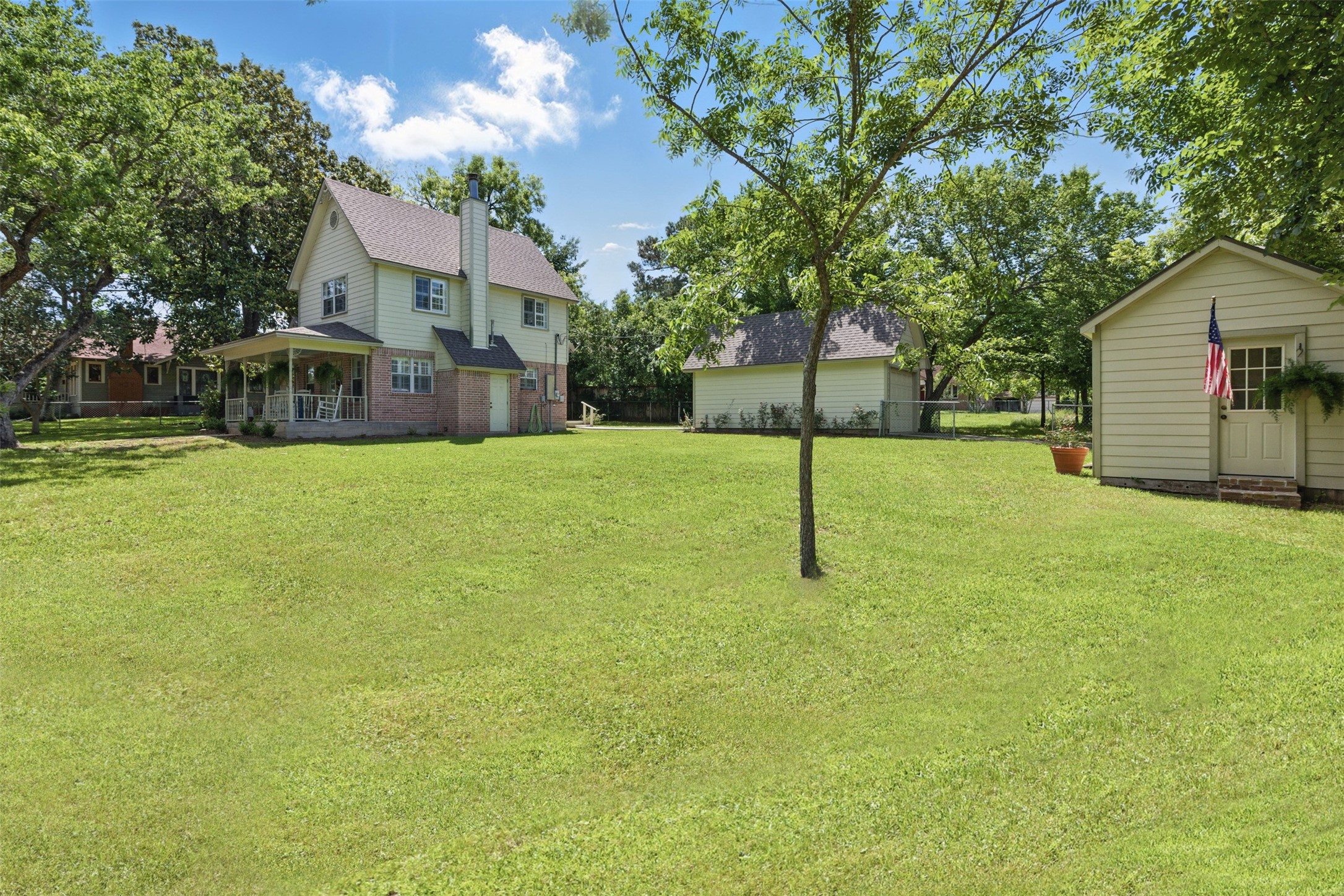 407 West Main Street Brenham, TX 77833 - Photo 39 of 50 a house that has a tree in front of it