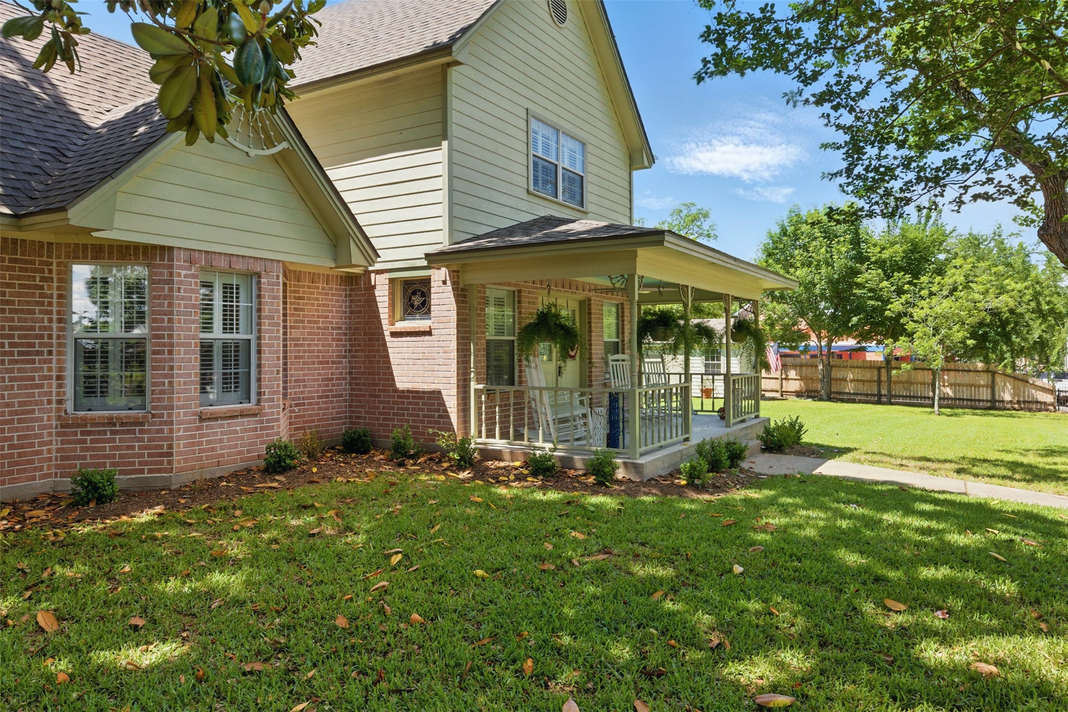 407 West Main Street Brenham, TX 77833 - Photo 6 of 50 a view of a chair and table in backyard of house