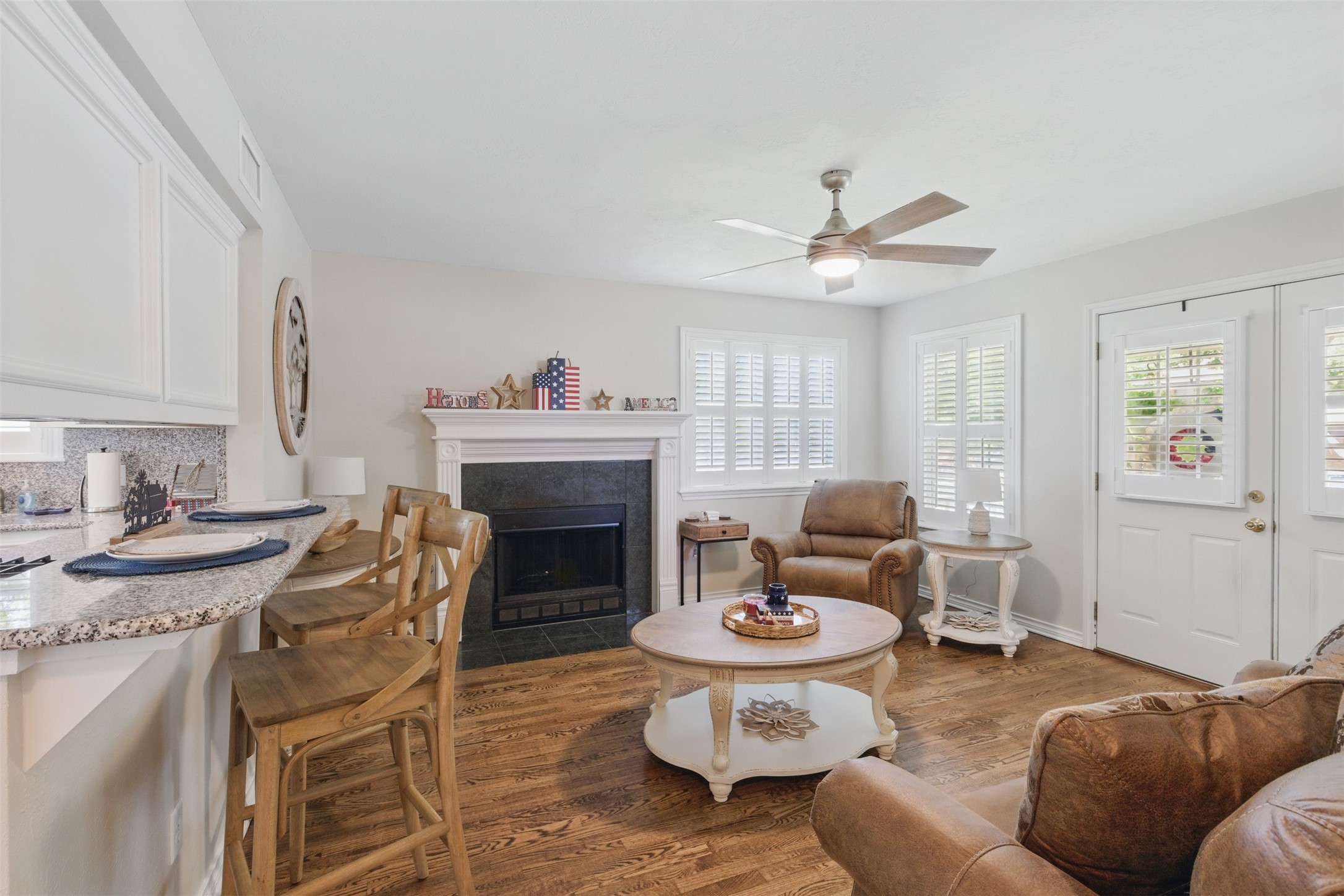 407 West Main Street Brenham, TX 77833 - Photo 9 of 50 a living room with furniture and a fireplace