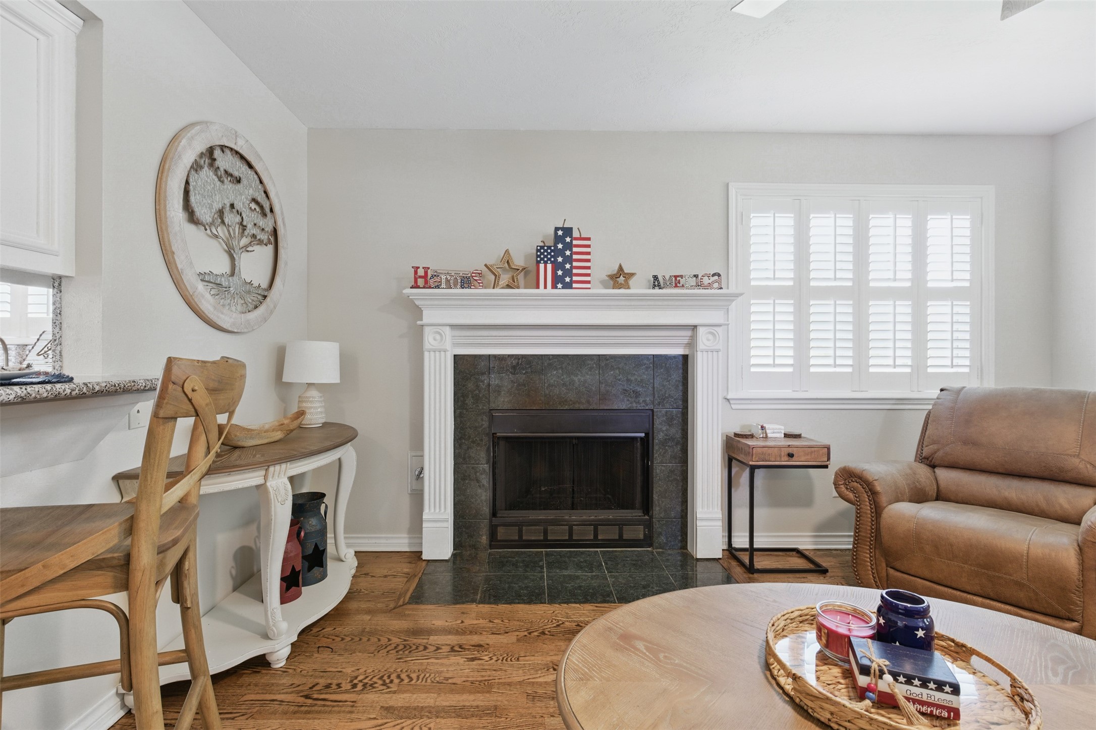 407 West Main Street Brenham, TX 77833 - Photo 10 of 50 a living room with furniture and a fireplace