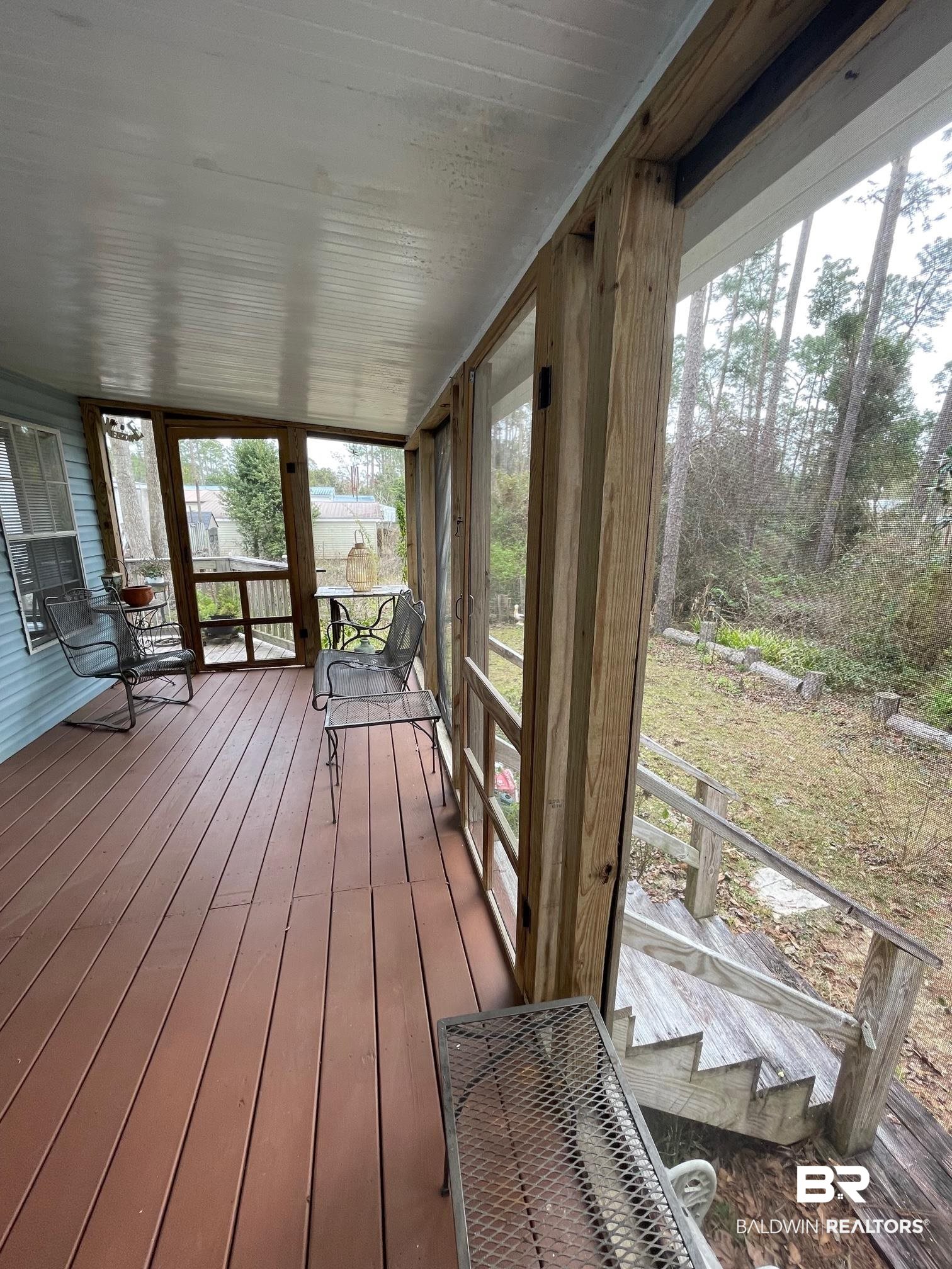 1395 Ridgewood Drive Lillian, AL 36549 - Photo 4 of 39 Back screened porch