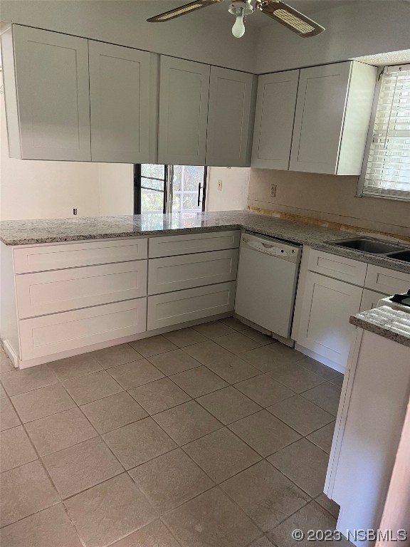 2410 Lime Tree Drive Edgewater, FL 32141 - Photo 18 of 18 a kitchen with a sink and cabinets