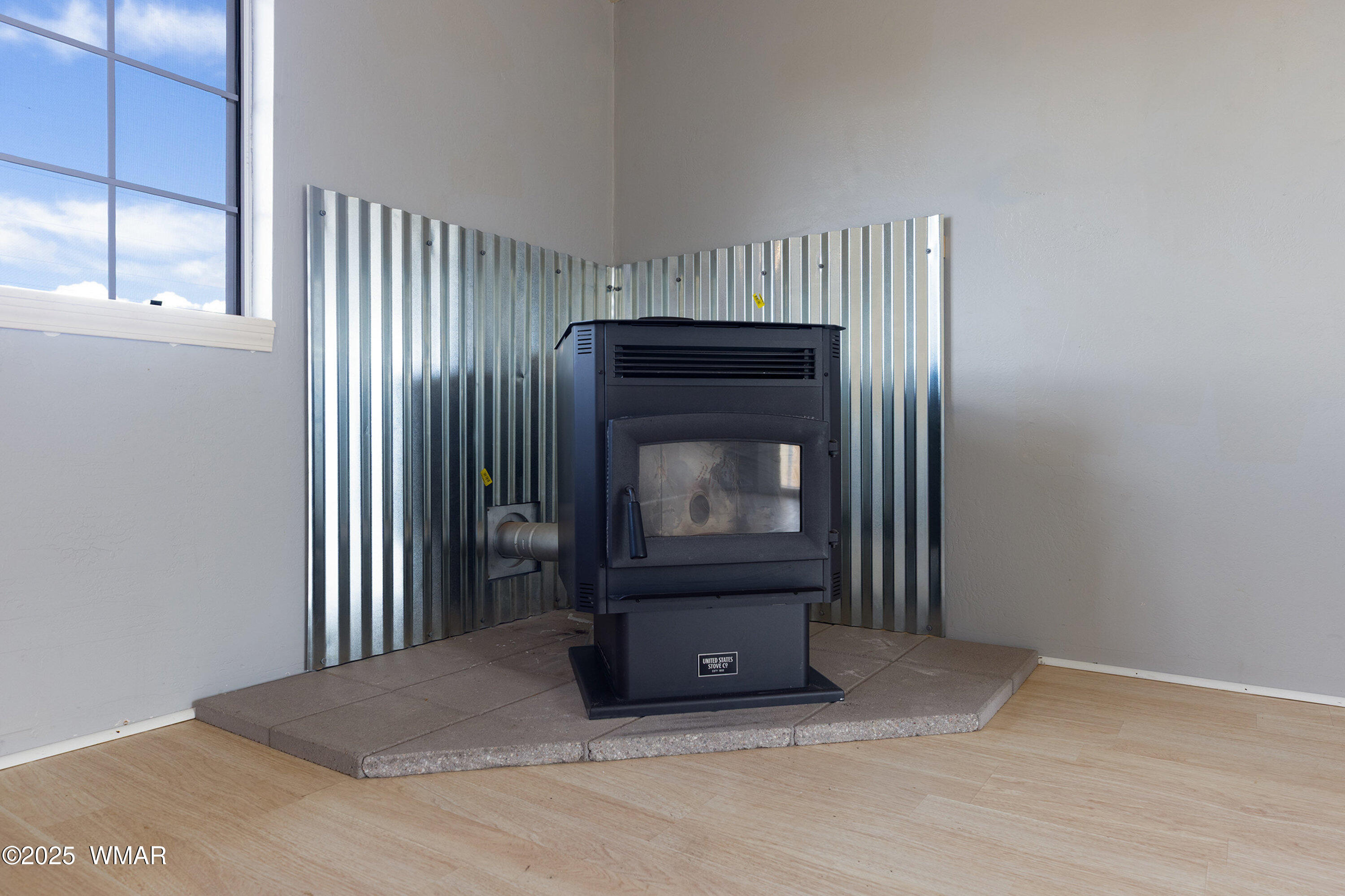 1075 Rim View Drive Show Low, AZ 85901 - Photo 8 of 22 Pellet Stove Family Room