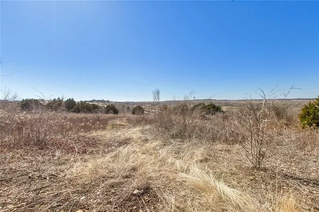 an aerial view of beach and yard