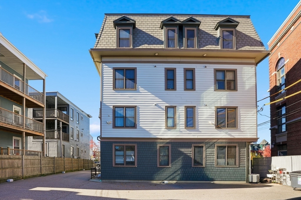246 Boston Street, Unit 9 Boston, MA 02125 - Photo 21 of 24 a front view of residential houses