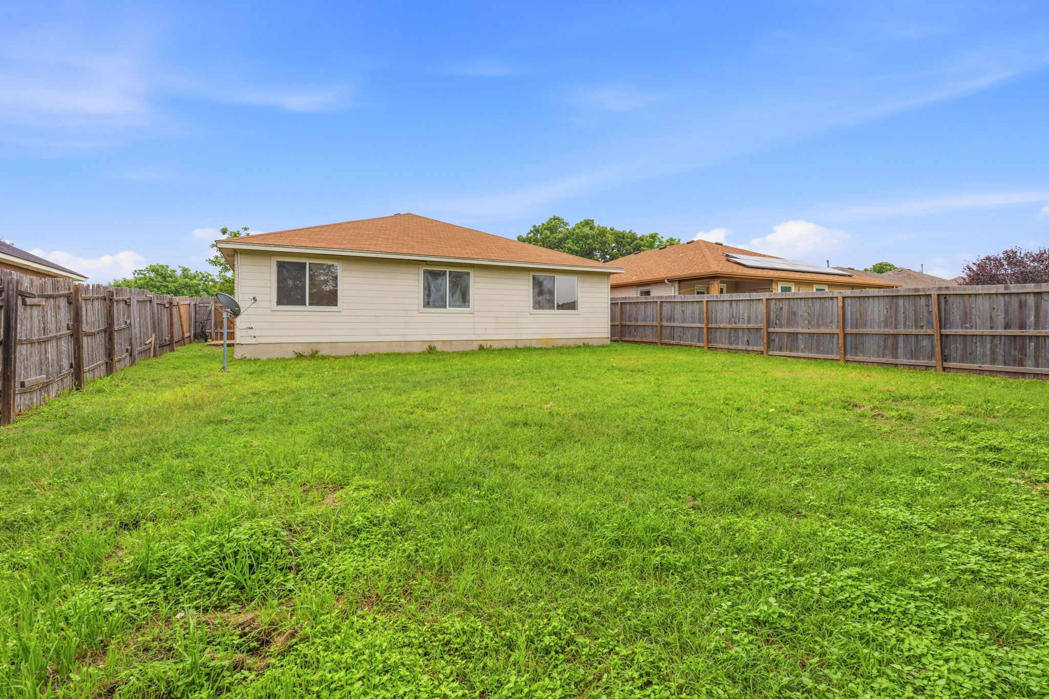 116 Blue Ridge Trail Elgin, TX 78621 - Photo 26 of 28 a view of a house with a yard and a porch