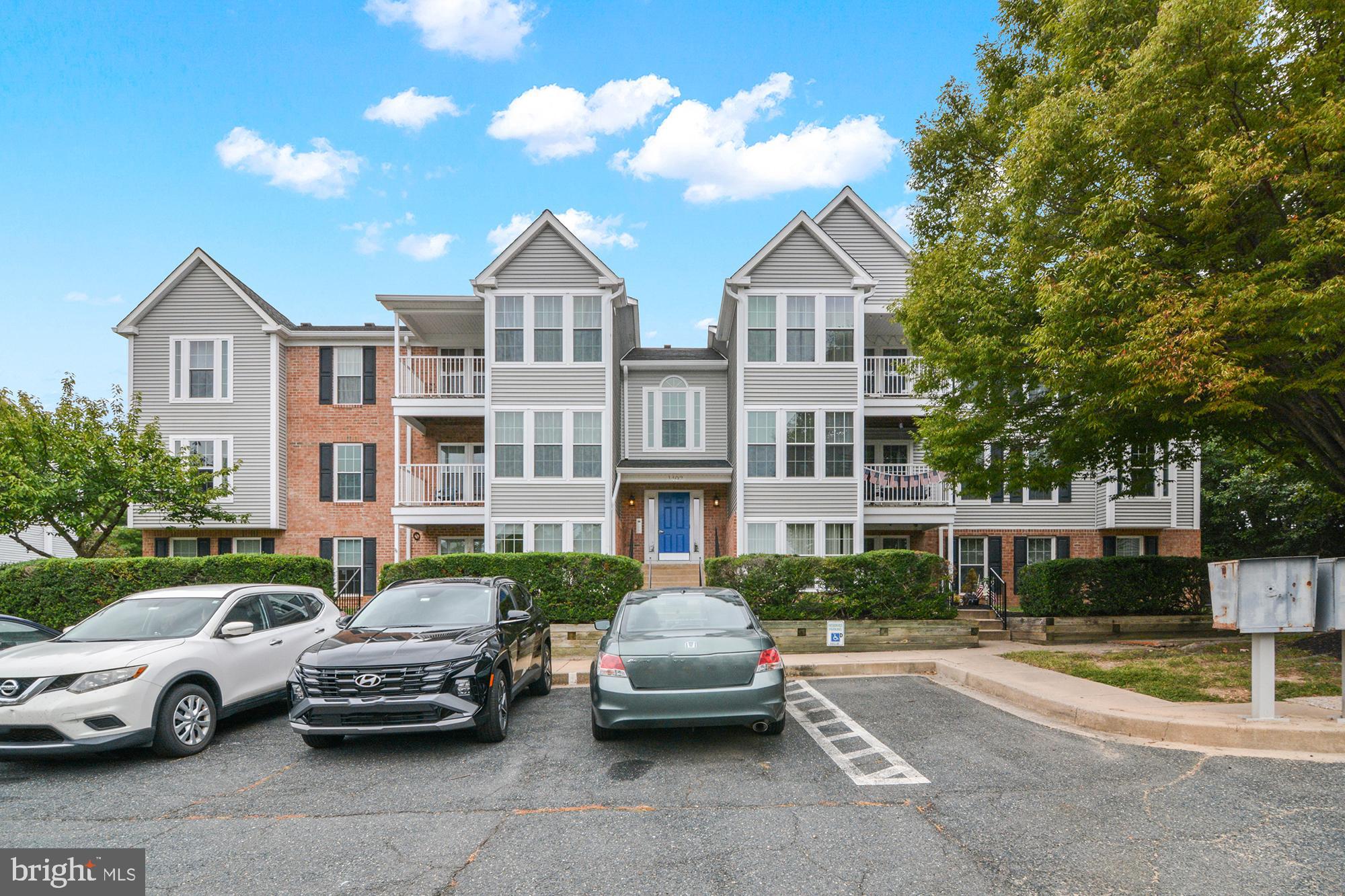 1402 Golden Rod Court, Unit 5 Belcamp, MD 21017 - Photo 1 of 28 a car parked in front of a house