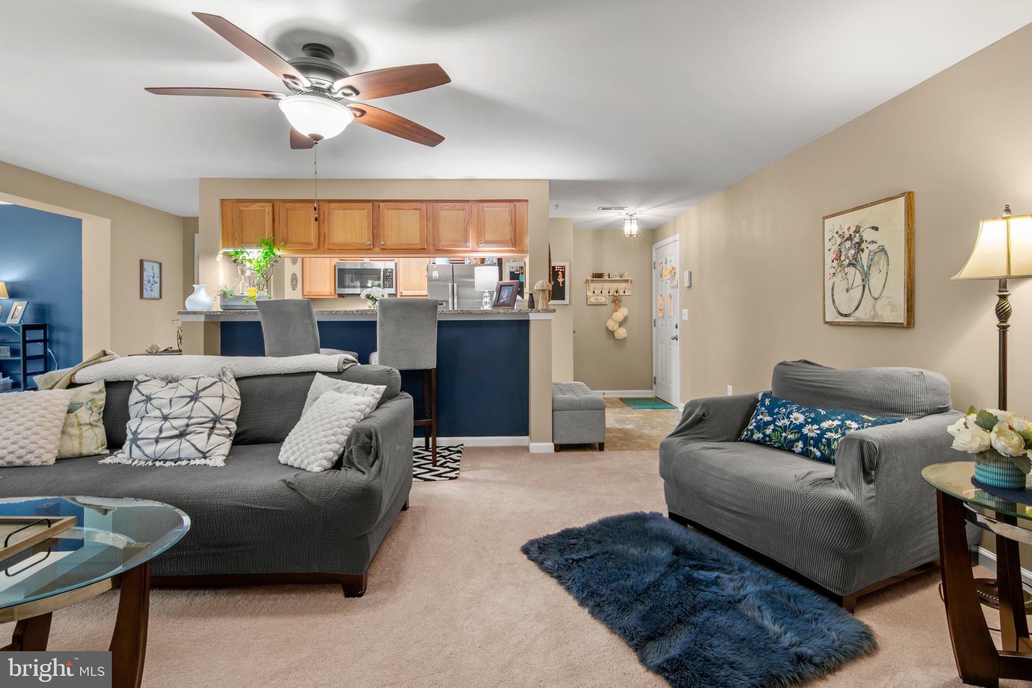 1402 Golden Rod Court, Unit 5 Belcamp, MD 21017 - Photo 10 of 28 a living room with furniture and a large window