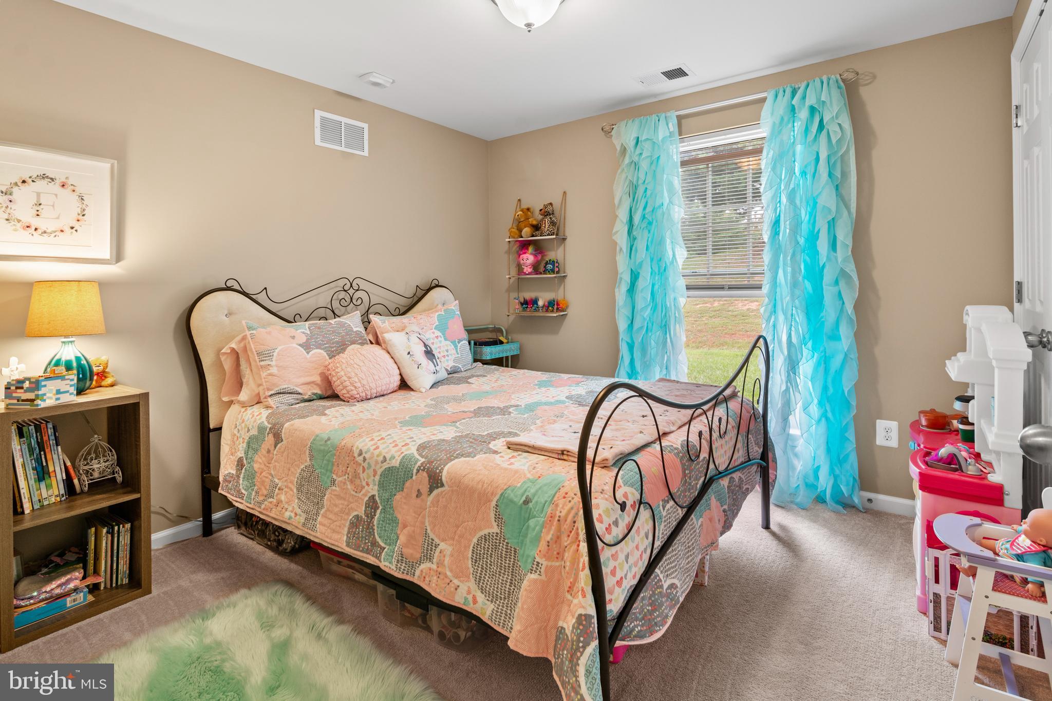 1402 Golden Rod Court, Unit 5 Belcamp, MD 21017 - Photo 20 of 28 a bedroom with a bed table and a window