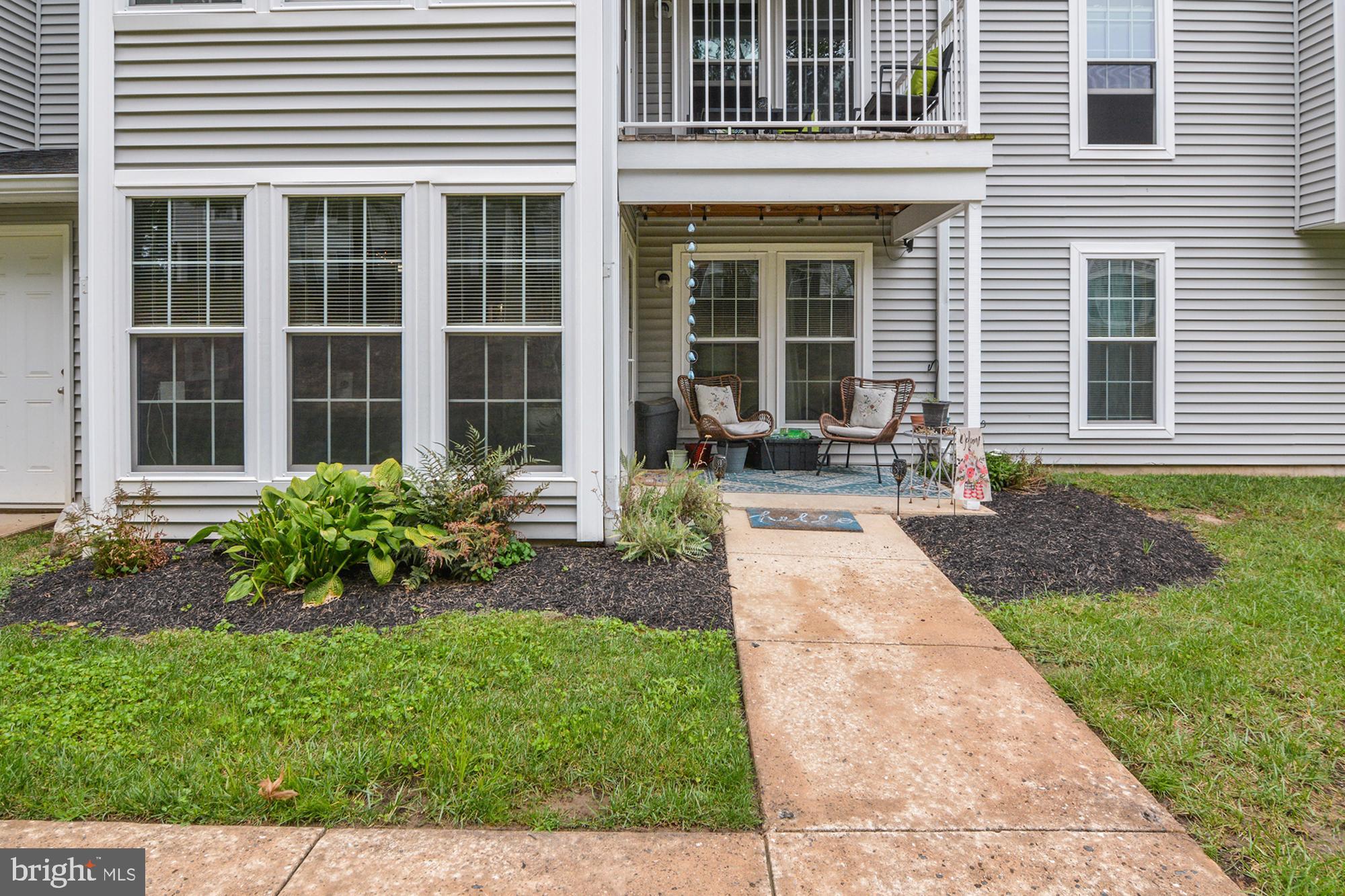 1402 Golden Rod Court, Unit 5 Belcamp, MD 21017 - Photo 24 of 28 a front view of a house with garden