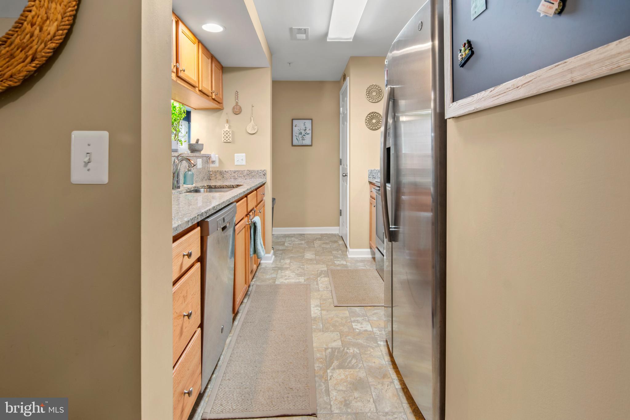 1402 Golden Rod Court, Unit 5 Belcamp, MD 21017 - Photo 4 of 28 a bathroom with a sink and mirror