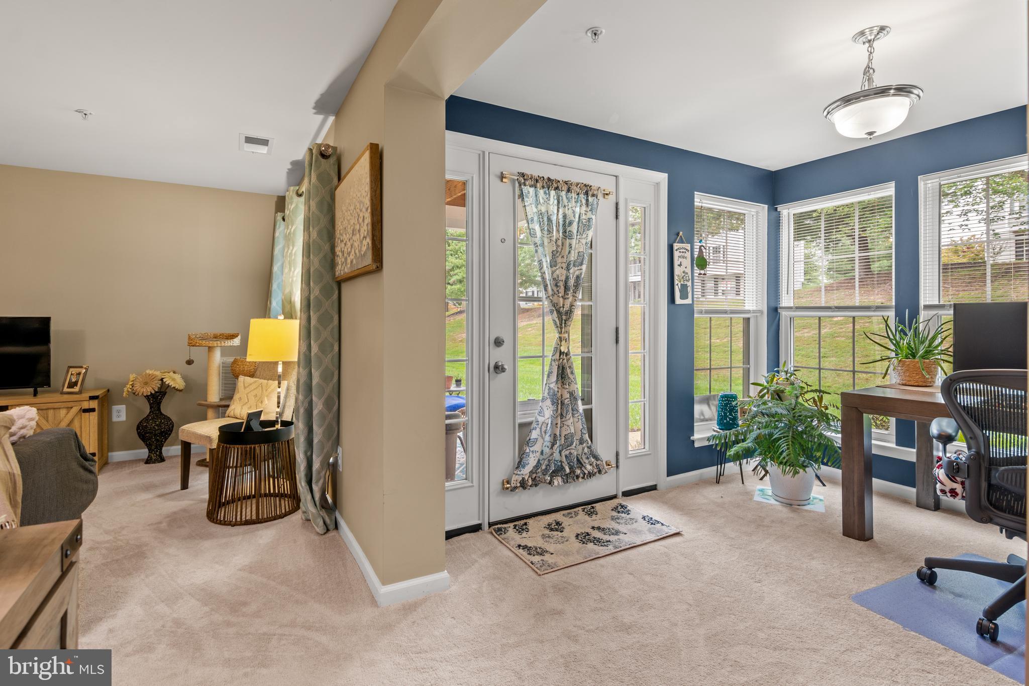 1402 Golden Rod Court, Unit 5 Belcamp, MD 21017 - Photo 7 of 28 a view of a livingroom with furniture and a window