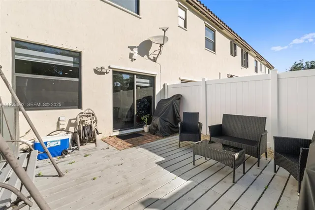 a view of a house with sitting area