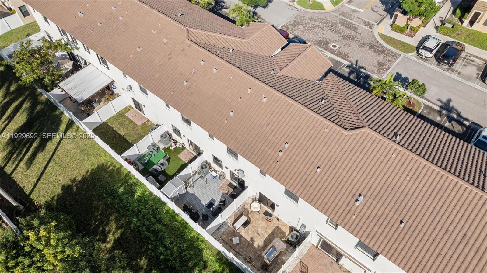 3272 West 92nd Place Hialeah, FL 33018 - Photo 33 of 37 an aerial view of a house with a large space